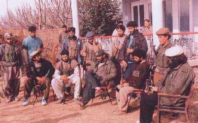 Terrorists at a hide-out in Kashmir.