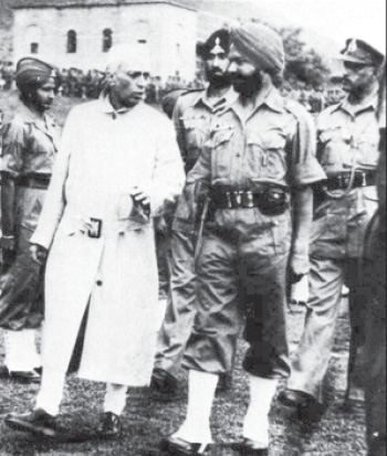 Pt. Nehru during his Kashmir visit in 1947. On his right is General Kulwant Singh.